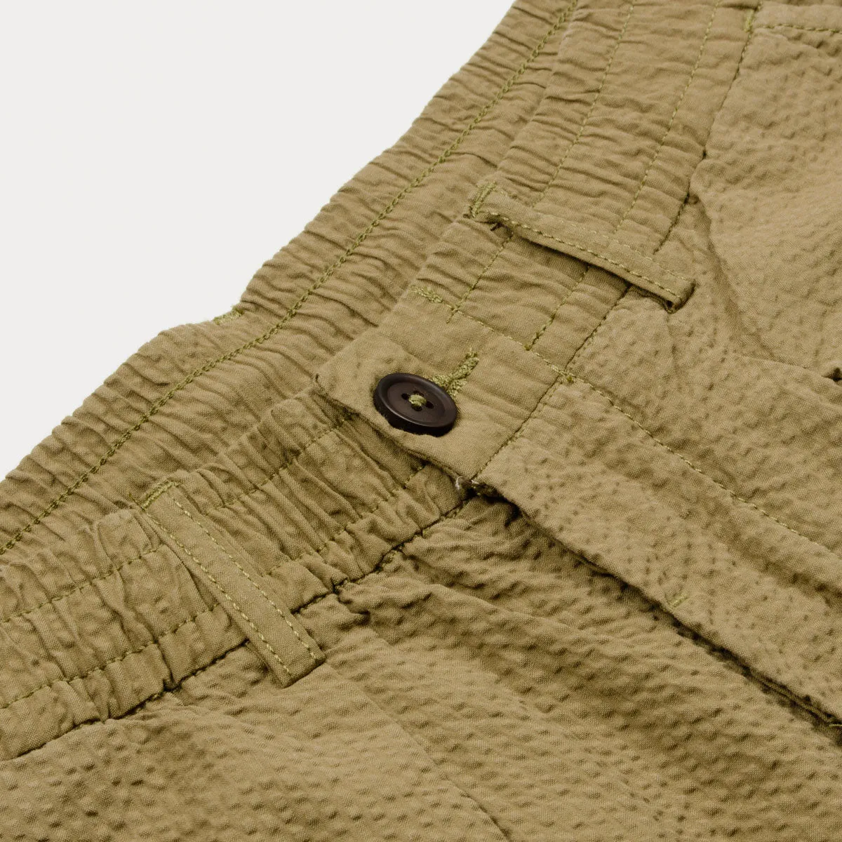 Universal Works Pleated Track Pant in Olive Green Seersucker