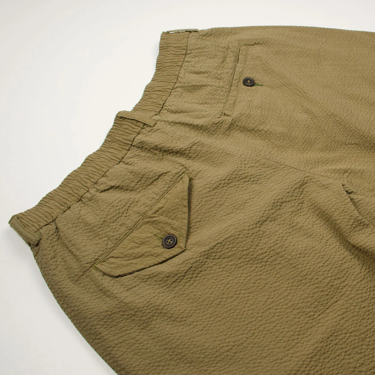 Universal Works Pleated Track Pant in Olive Green Seersucker