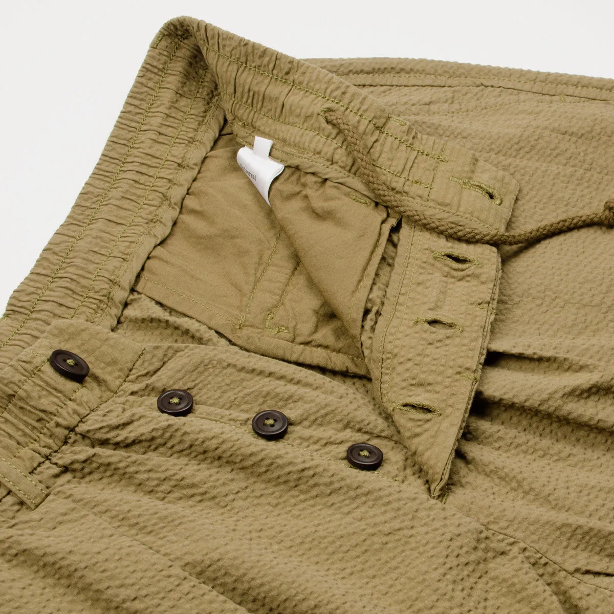 Universal Works Pleated Track Pant in Olive Green Seersucker